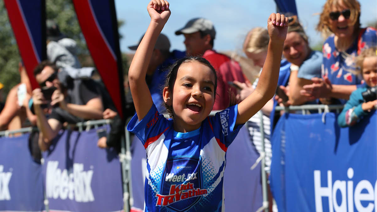 Kids participating in different activities at Weet-Bix Tryathlon